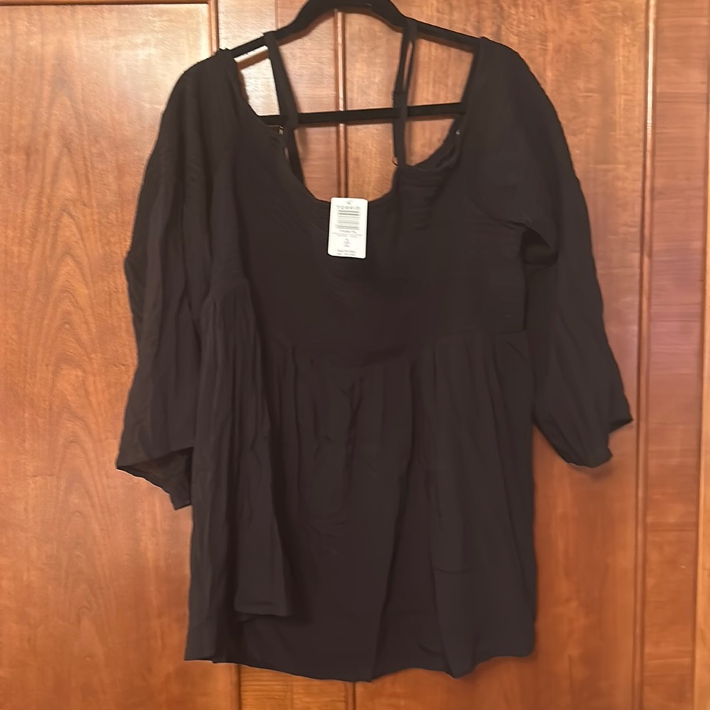 Never worn. Tickets on. Off the shoulder ribbed top.